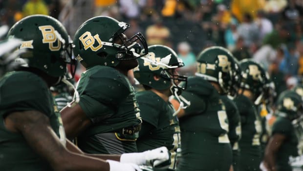 Baylor players warm up before the game against Northwestern State Demons Saturday night in McLane Stadium. The Bears beat the Demons 70-6.