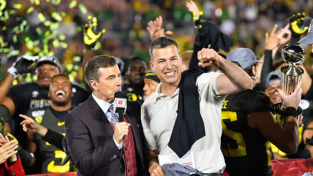 PASADENA, CALIFORNIA - JANUARY 01: Head coach Mario Cristobal of the Oregon Ducks celebrates the win with his team after the game against the Wisconsin Badgers at the Rose Bowl on January 01, 2020 in Pasadena, California. The Oregon Ducks topped the Wisconsin Badgers, 28-27. (Photo by Alika Jenner/Getty Images)