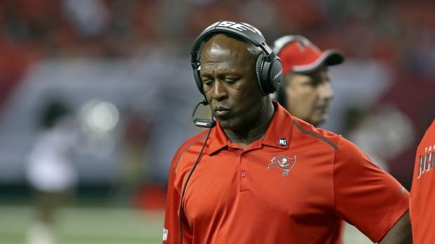 Sep 18, 2014; Atlanta, GA, USA; Tampa Bay Buccaneers coach Lovie Smith is shown on the sideline in the fourth quarter of their loss to the Atlanta Falcons at the Georgia Dome. The Falcons won 56-14. Mandatory Credit: Jason Getz-USA TODAY Sports
