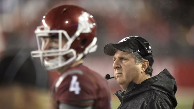 WSU head coach Mike Leach stands on the sidelines with quarterback  Luke Falk (4) during the first half of a Pac-12 college football game against Stanford on Saturday, Oct 31, 2015, at Martin Stadium in Pullman, Wash.  TYLER TJOMSLAND tylert@spokesman.com