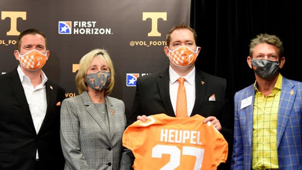 From left University of Tennessee athletic director Danny White, UT chancellor Donde Plowman, University of Tennessee head football coach Josh Heupel, and president of the UT System Randy Boyd, pose for a photo after a press conference announcing Heupel as football head coach, in the Stokely Family Media Center in Neyland Stadium, in Knoxville, Tenn., Wednesday, Jan.27, 2021. Heupel0127 0300