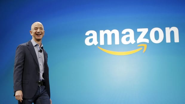 FILE - In this June 16, 2014, file photo, Amazon CEO Jeff Bezos walks onstage for the launch of the new Amazon Fire Phone, in Seattle. Bezos offered a glimpse of his vision for the future during an interview on May 31, 2016, at the Code Conference in Rancho Palos Verdes, Calif. (AP Photo/Ted S. Warren, File)