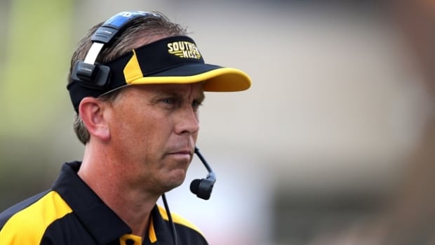 Aug 31, 2013; Hattiesburg, MS, USA; Southern Miss Golden Eagles head coach Todd Monken on the field in the first quarter during their game against the Texas State Bobcats at M.M. Roberts Stadium. Mandatory Credit: Chuck Cook-USA TODAY Sports