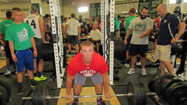 Josh Carden of Manatee prepares to compete in the clean event at the 2015 Football Weightlifting Meet on Tuesday at Venice High's weightroom. Carden won the 225-pound weight class. STAFF PHOTO / DENNIS MAFFEZZOLI