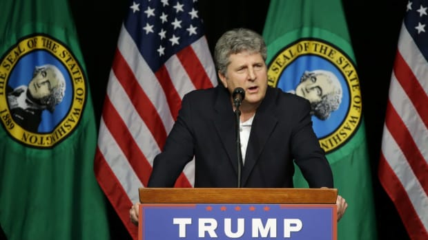 Mike Leach head football coach at Washington State University, speaks in support of Republican presidential candidate Donald Trump during a rally in Spokane, Wash., Saturday, May 7, 2016. (AP Photo/Ted S. Warren) ORG XMIT: WATW122