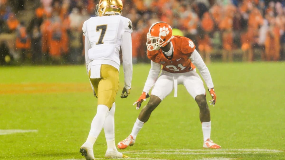 Browns defenders wear boxing gloves in practice