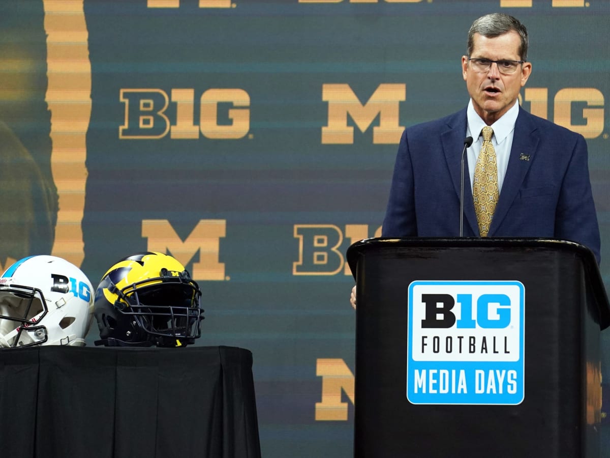 Jim Harbaugh calls Michigan president to say he's staying