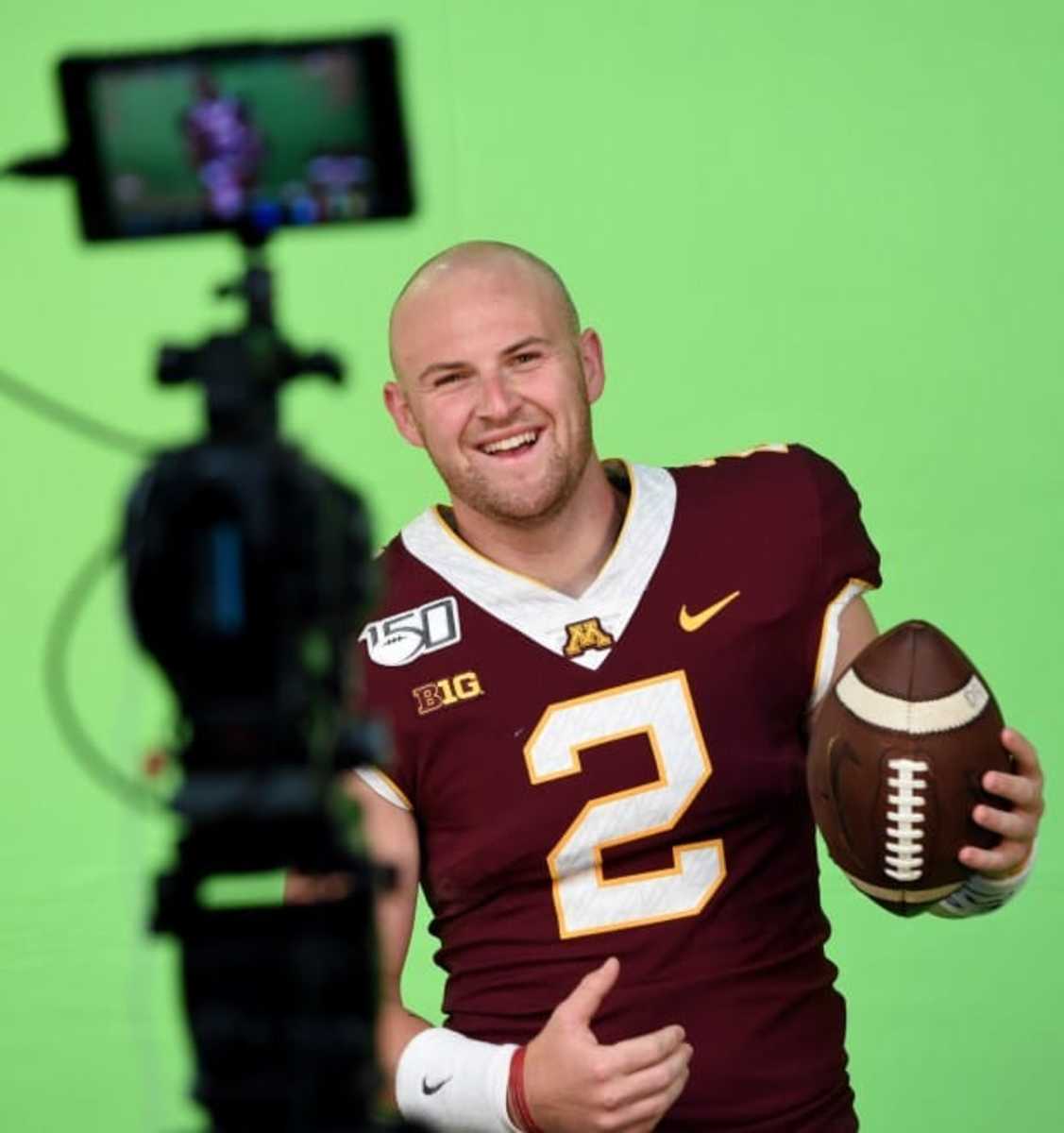Quarterback Tanner Morgan dances for a game day video segment during the Minnesota Gophers football team media day in Minneapolis on Tuesday, July 30, 2019. (John Autey / Pioneer Press)