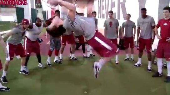 Arkansas is ending their offseason workouts with....backflips? (video)