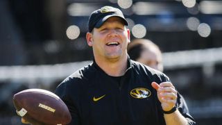 Two assistant coaches get raises before coaching their first game (Arkansas)