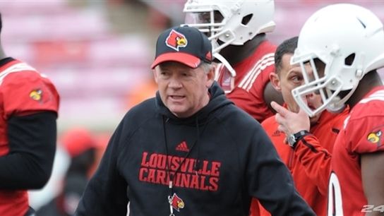 What team outside of the preseason top 25 ends up ranked by the end of the year? (Louisville)