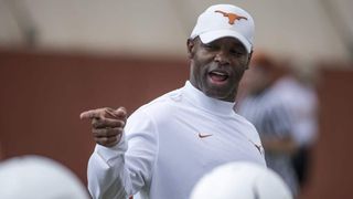 The Texas staff is telling upperclassmen "if you're in a dead-heat with a freshman, we're playing them" (upperclassmen)
