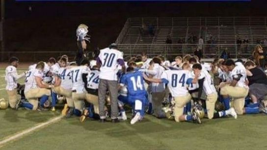 Washington high school coach "under investigation" for praying after games (Featured)