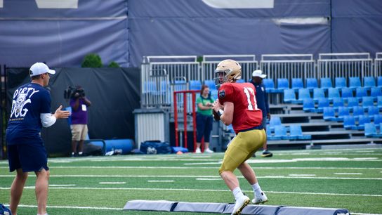 Watch: ND quarterback gets finger popped into place, throws game-winning TD