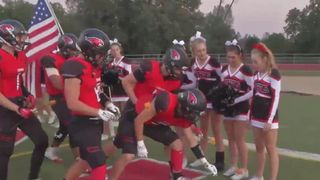 A high school team's touching tribute to a cheerleader battling cancer has become a viral sensation (Featured)