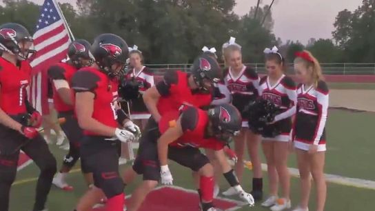 A high school team's touching tribute to a cheerleader battling cancer has become a viral sensation (Featured)