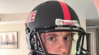 An Arkansas State associate AD is wearing a football helmet until the Red Wolves sell 10,000 tickets (Arkansas State)