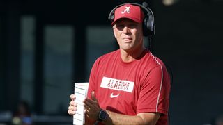 Coach wins a national title, then takes another college job two days later. Could that happen in football? (Bob Bowman Texas)