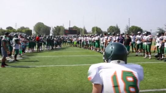 Video: Watch a college president put on the pads and go out to practice with the team (California)