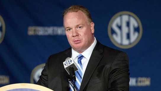 Mark Stoops explains why traveling for midweek games can be "weird" at #SECMD15