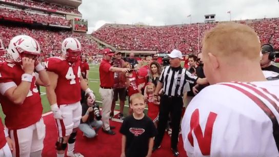 Military dad holds surprise reunion with family at Nebraska spring game (Nebraska)