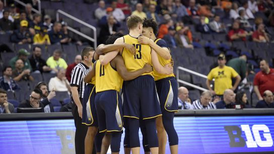 Michigan's basketball team just showed how to respond to a sudden change situation (john beilein)