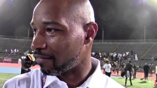 High school fires coach for team's chant with racial slur