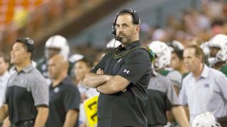 Down 42-3, Hawaii head coach Nick Rolovich had the sideline benches removed Saturday (bench)