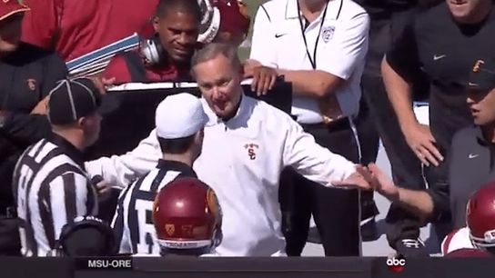 Video: USC AD Pat Haden runs to the sideline, argues with refs