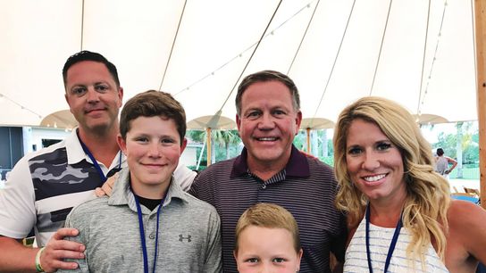 The football coach, the girl with cancer, and the bracelet that binds them