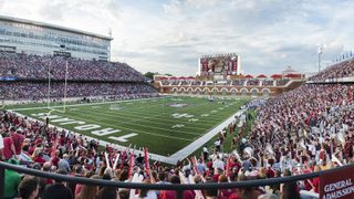 Sources: Troy's finalists include Alabama, Kentucky, West Virginia assistants; final interviews underway (Head Coaching Candidates)