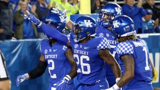 Stoops' UK staff overhaul continues with new OL coach (Mark Stoops)