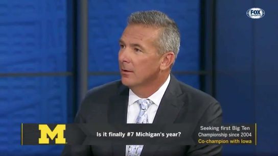 One day in, Urban takes first veiled shot at Harbaugh (Featured)