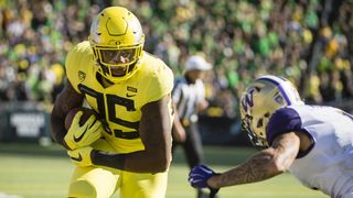 Chris Petersen says he feels bad for beating Oregon 70-21 (Mark Helfrich)